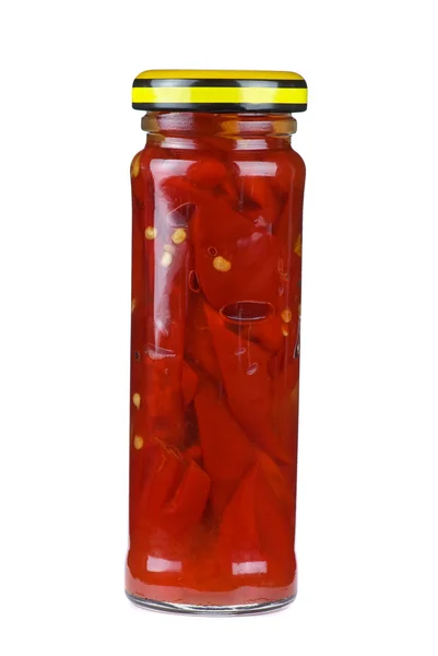 Glass jar with marinated chili peppers — Stock Photo, Image