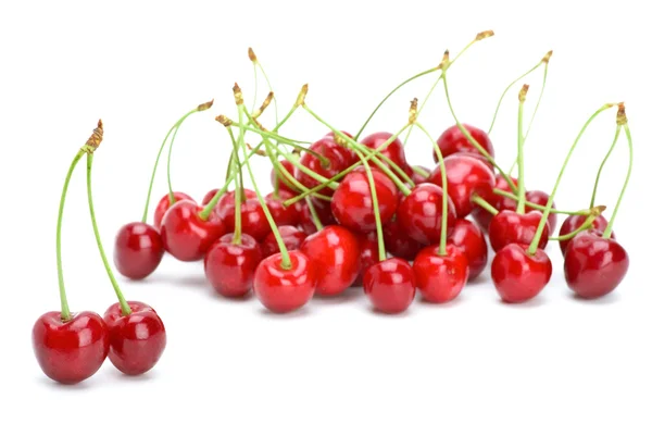 Algunas cerezas rojas maduras con tallos —  Fotos de Stock