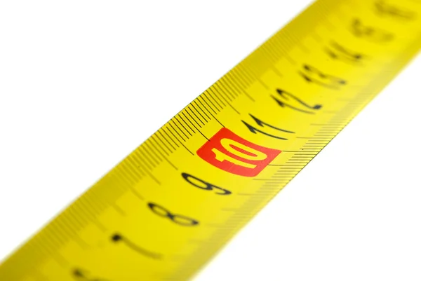 Primer plano de cinta métrica de metal amarillo — Foto de Stock