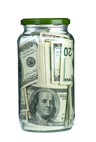 Доллары "сохраняются" в стеклянной банке — стоковое фото