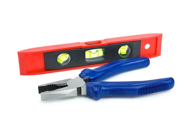 Bubble level tool and pliers — Stock Photo, Image