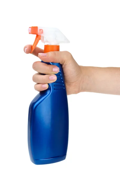 Mão segurando frasco pulverizador azul — Fotografia de Stock