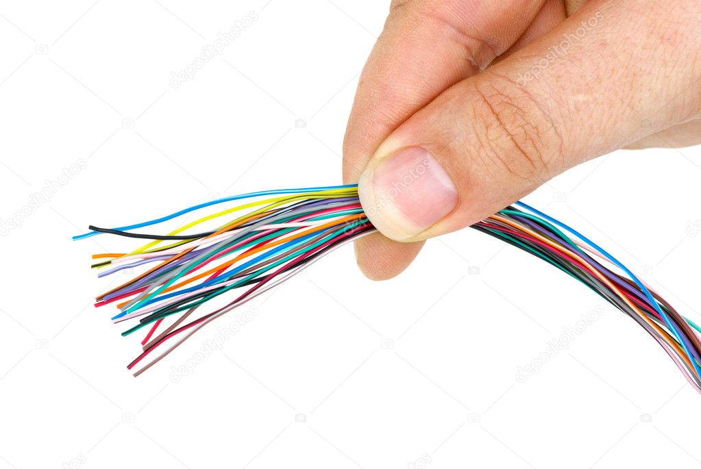 Hand holding bunch of different colored wires