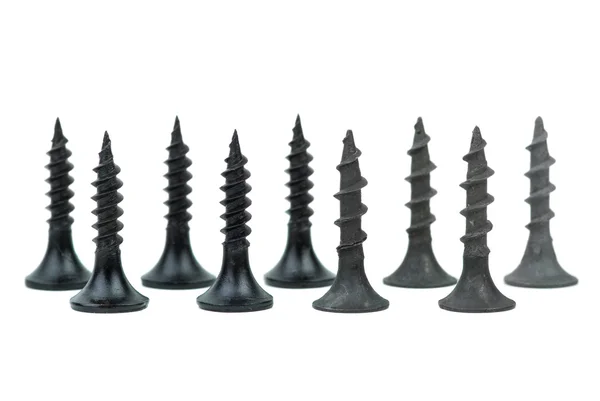 Few standing metal and wood screws — Stock Photo, Image
