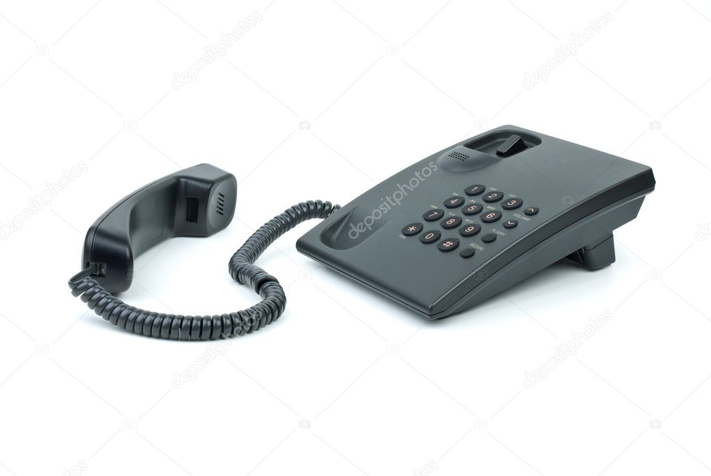 Black office phone with handset near