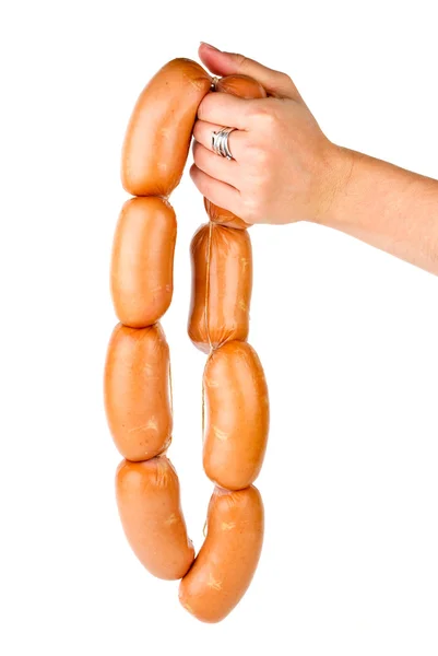 Hand holding sausages chain — Stock Photo, Image