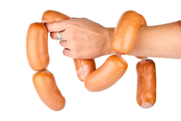 Hand holding sausages chain isolated on the white background — Stock Photo, Image