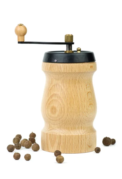 Wooden spice handmill and allspice — Stock Photo, Image