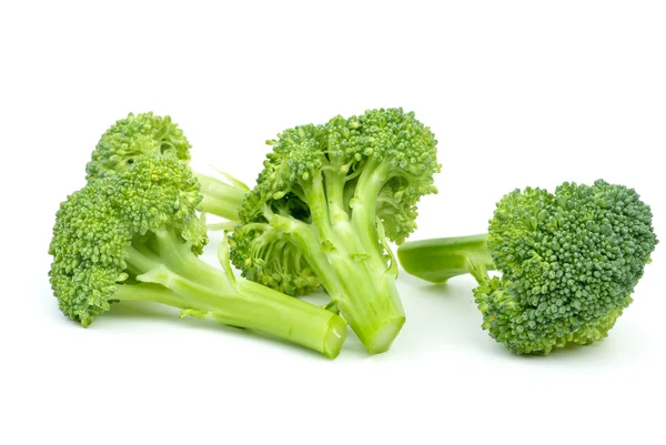 Três pedaços de brócolis — Fotografia de Stock