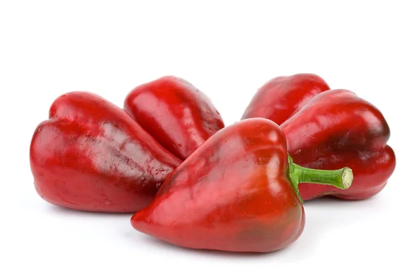 Five red sweet peppers — Stock Photo, Image