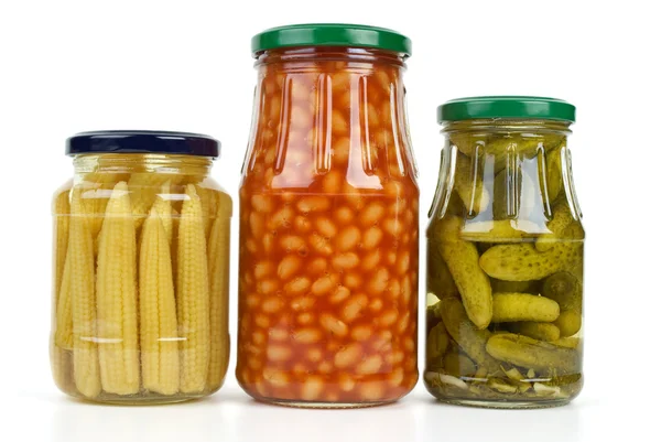 Glass jars with marinated vegetables — Stock Photo, Image