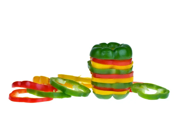 Red, yellow and green bell pepper slices — Stock Photo, Image