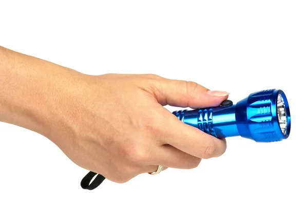 Blue metal LED flashlight in hand — Stock Photo, Image
