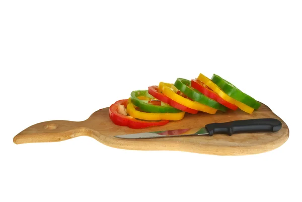 Cutting board with sliced bell pepper and knife — Stock Photo, Image