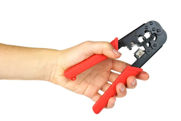 Mão segurando ferramenta de corte de crimpagem — Fotografia de Stock