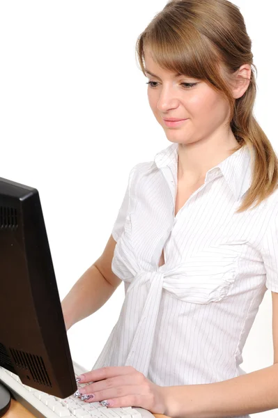 Donna con un computer desktop — Foto Stock