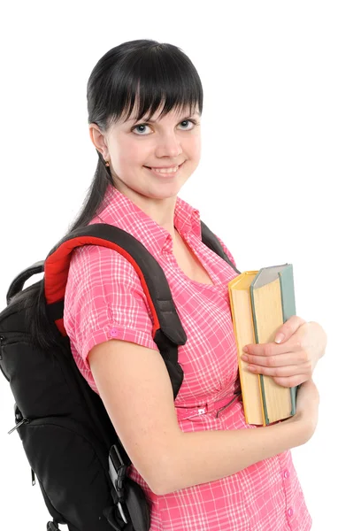 Ung kvinna med bok och ryggsäck — Stockfoto