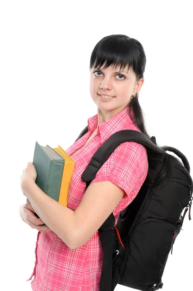 Молода жінка з книгою і рюкзаком — стокове фото