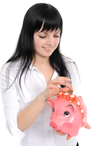 Mulher com um banco porquinho — Fotografia de Stock