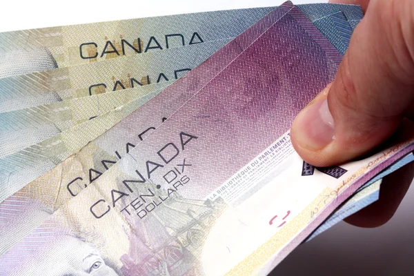 加拿大货币在手 — 图库照片