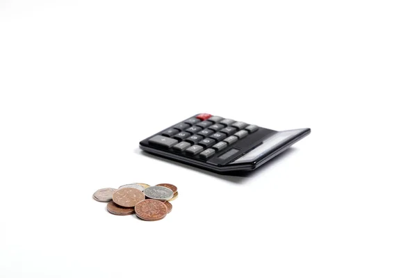 Calculadora e moedas — Fotografia de Stock