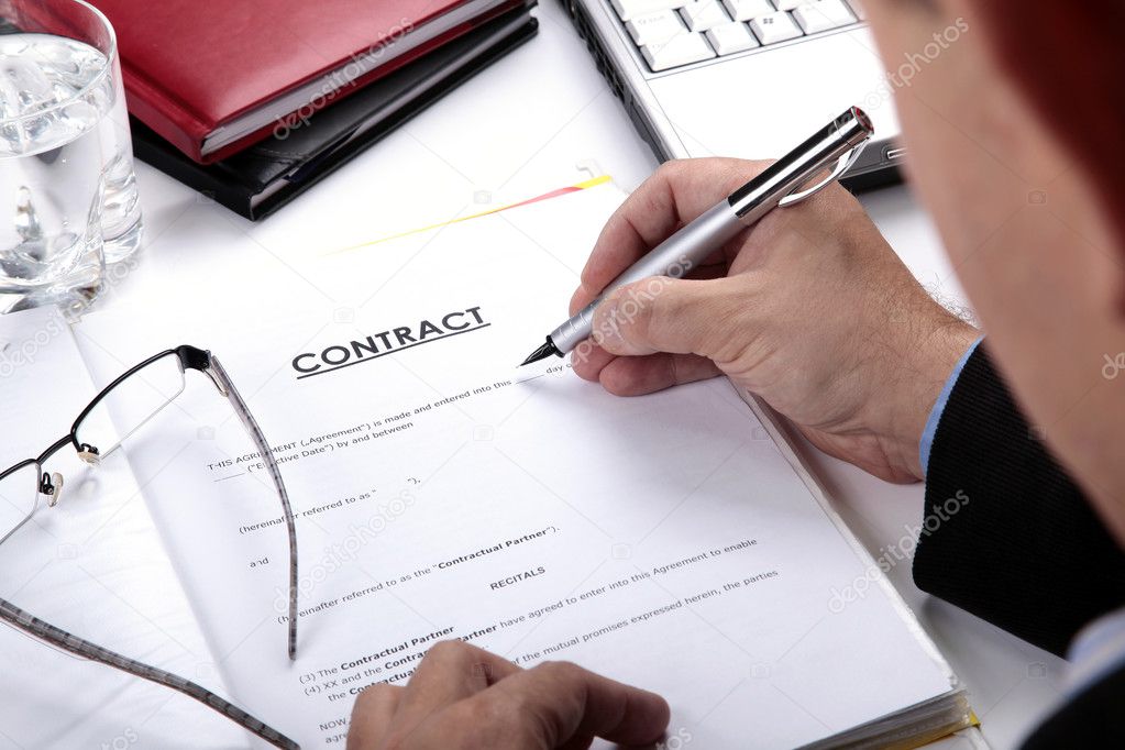 businessman-signing-contract-stock-photo-zwolafasola-3104896