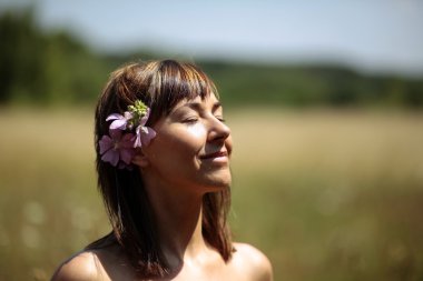 Woman on meadow clipart