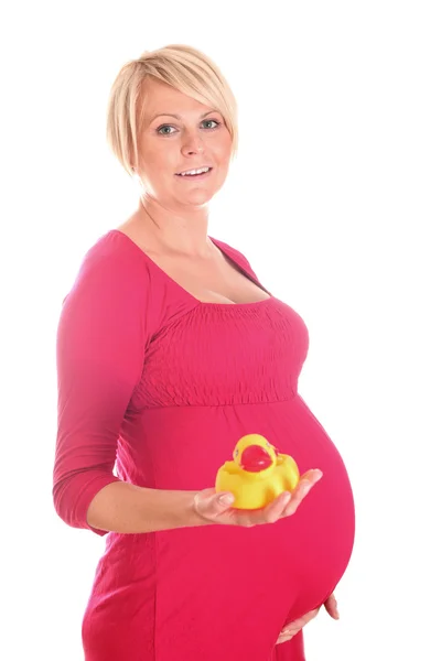Kobieta w ciąży z gumową kaczkę — Zdjęcie stockowe