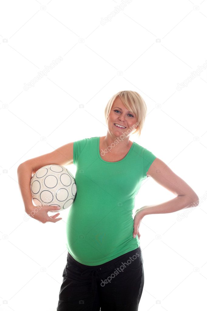 Pregnant woman with fotball ball