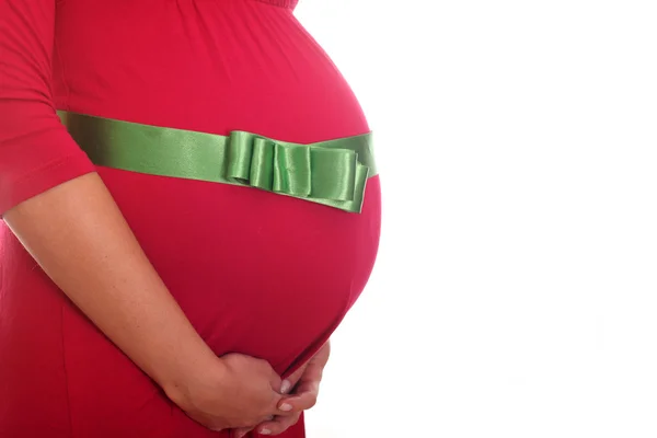 Těhotné břicho k Vánocům — Stock fotografie
