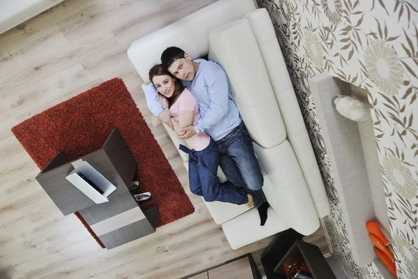 Couple relax at home on sofa — Stock Photo, Image