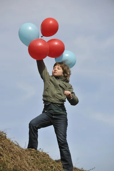 Balonlar açık olan kız — Stok fotoğraf