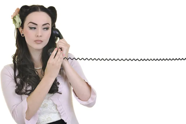 Mooi meisje praten over oude telefoon — Stockfoto