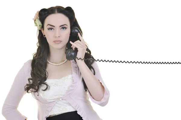 Красивая девушка разговаривает по старому телефону — стоковое фото