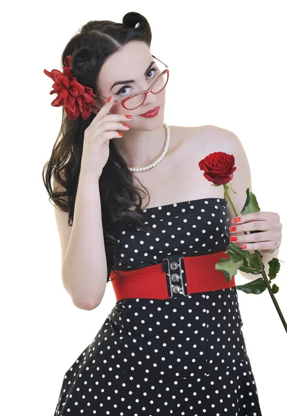 Ung kvinna med rosa blomma isolerad på vit — Stockfoto