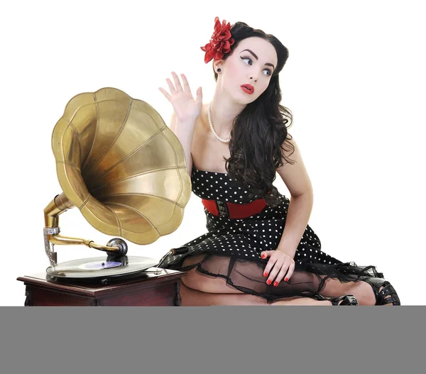 Pretty girl listening music on old gramophone — Stock Photo, Image