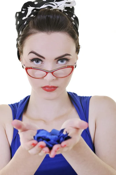 Young woman holding blue flower in hands — Stock Photo, Image