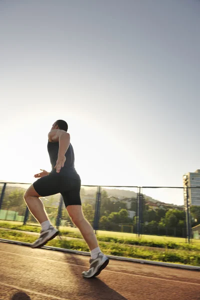 Jovem atleta correndo — Fotografia de Stock