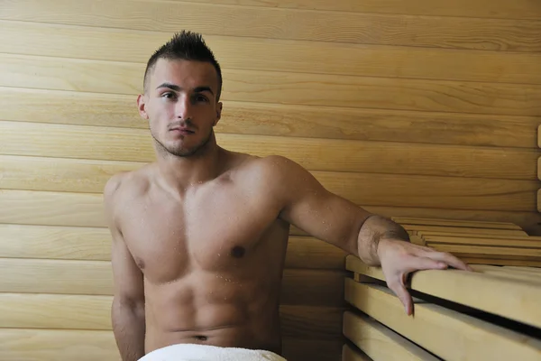 Attractive young man in sauna — Stock Photo, Image