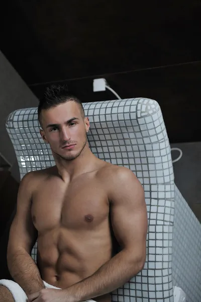 Attractive young man in sauna — Stock Photo, Image