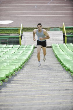 Young athlete running clipart