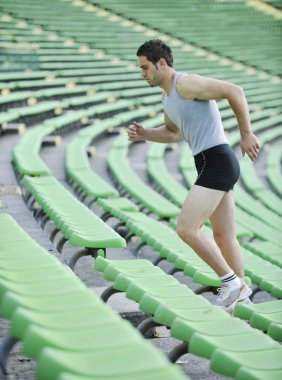 Young athlete running clipart