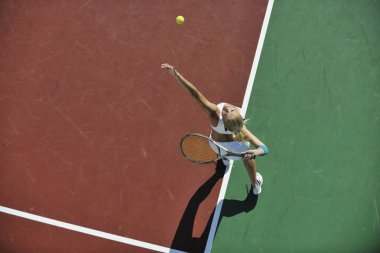 Young woman play tennis clipart