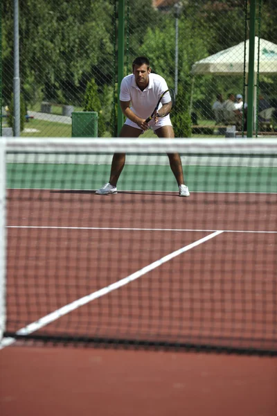 Young man play tennis outdoor — Stock Photo, Image