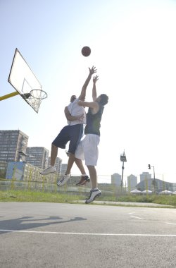 Streetball game at early morning clipart