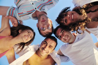 group running on the beach clipart