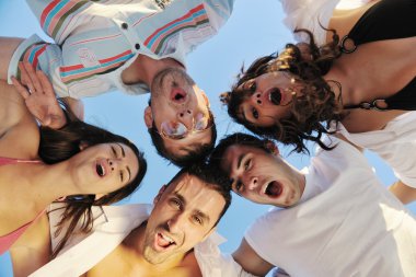 group running on the beach clipart