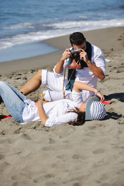 Couple jogging on the beach — Stock Photo, Image