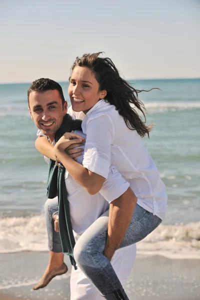 Happy young couple have fun at beautiful beach — Stock Photo, Image
