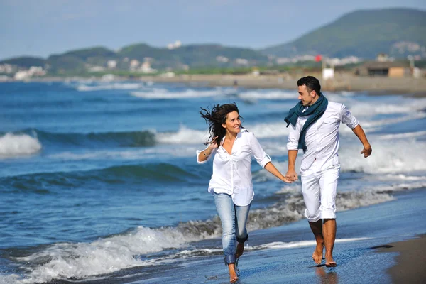 Happy young couple have fun at beautiful beach Royalty Free Stock Photos